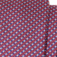 Wąski krawat w błękitną, granatową i czerwoną kratkę