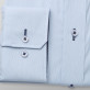 Błękitna taliowana koszula z kontrastami