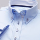 Błękitna bluzka z granatowymi i białymi kontrastami