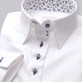 Biała bluzka z kontrastami w granatowe kwiatki