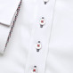 Biała bluzka z granatowo-czerwonymi kontrastami